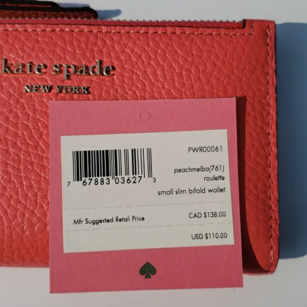 Kate Spade Leather Roulette Small Slim Bifold Wallet. Color: Peachmelba.